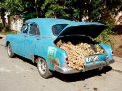Whether transporting people or produce, Cubans make smart use of the cars they have.